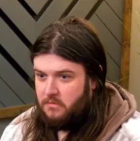 Stephen C seated playing low stakes cash game poker on the Poker At The Lodge livestream.