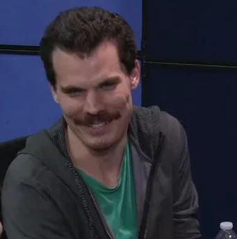 Zach "The Stache" seated playing high stakes cash game poker at The Lodge livestream.