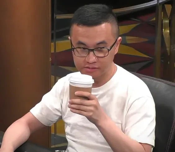 Victor "Professor" Wu seated playing high stakes cash game poker at Hustler Casino Live.