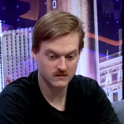 Wilson seated playing high stakes cash game PLO4 poker on the Venetian Poker Live stream.